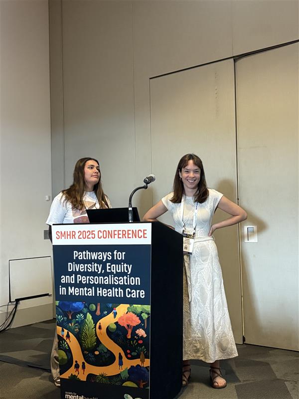 Bek Morrison and Dr Hayley Jackson of the Healing Kids, Healing Families team presenting at SMHR 2025 in Adelaide.