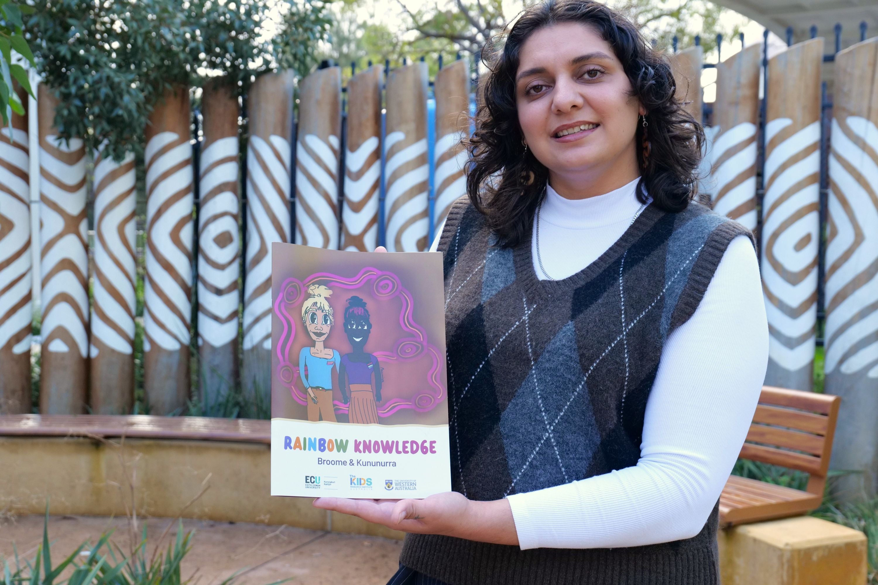 Lead author Lily Hayward with the report.